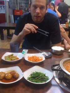 Sean ponders how to eat dinner. (Charlie Crespo)