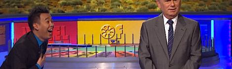 Contestant amazingly solves puzzle in the bonus round of Wheel of Fortune as Pat Sajak looks on